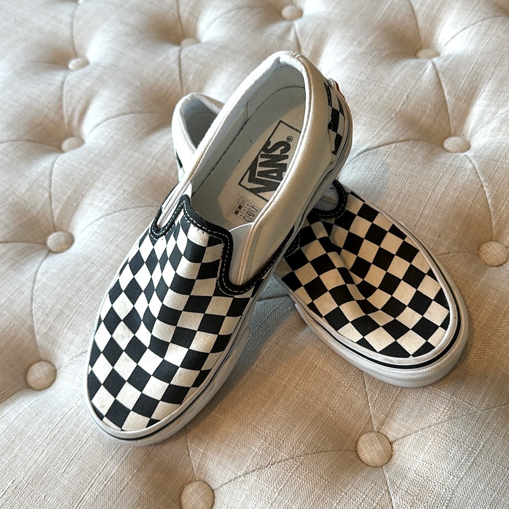 Vans! Iconic black and white checkered slip on. Worn once.